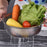 Stainless steel washing bowl with collapsible design.