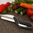 2-in-1 food chopper with handle for versatile cutting and dicing.