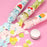 Flower-shaped soap strips in a test tube for on-the-go hand washing