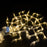 Detailed view of the decorative string lights with hanging props for festive decoration.