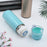 Stainless steel vacuum bottle with cup lid.