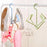 Rotating shoe rack with four hooks, portable, dual-use for wet and dry shoes.