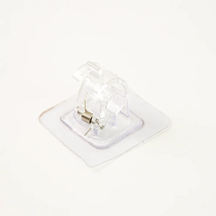 No-Drill Self-Stick Wall Clip with Spring Lock – Anti-Slip Holder for Mops & Tools (1 Pc)