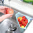 Triangular sink storage holder with functional design