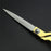 Gold-plated professional scissors for seamless fabric cuts.