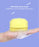 Close-up of silicone massage bristles on bath body brush with shampoo holder.