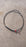 Drain cleaning tool with claw and spring, ideal for unclogging pipes and drains.