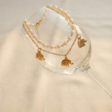 White Pearls With Elephant Charm Bracelet